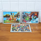 Stack of assorted educational wooden jigsaw puzzle boards for kids