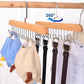 Innovative rotating hook design on the Organivo lotus wood hanger for easy access.