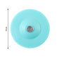 Soft silicone drain protector placed on floor shower drain