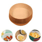 Air fryer basket kept clean with a disposable air fryer liner after cooking.