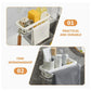 The retractable sink caddy efficiently holds various kitchen cleaning tools, optimizing space.