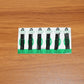 Black hair pins laid out for easy access during hair styling