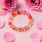 Hand wearing a lightweight beaded stretch bracelet for stylish accessorizing