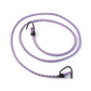 Secure bungee cord strap fastening a suitcase to a motorcycle for safe transport.
