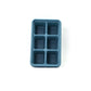 Empty blue silicone ice tray highlighting its compact design for small freezers.