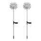 Solar landscape lights shaped as dandelion flowers decorating outdoor garden