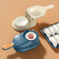 Person demonstrating the easy use of the 2-in-1 dumpling press tool.
