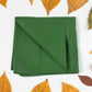 Hajj travel bag with essentials like a prayer mat and pouch, packed for convenience.