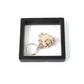 Mini nail clipper keychain in clear showcase with 3D floating effect