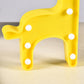 Decorative LED night light with giraffe design, suitable for shelves