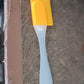 Vertical view showing the slim and compact design of silicone cooking spatula