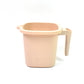 A clean white Plastic Bath Mug, perfect for a modern bathroom aesthetic.