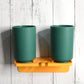Multipurpose wall mount toothbrush holder with two blue cups for hygienic bathroom storage.