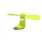 Small Mini USB fan in hand, ready for on-the-go cooling.