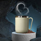 A Ganesh 400ml stainless steel coffee mug with its heat-resistant lid.