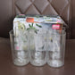 Detailed view of Supermom Martini plastic clear glass set showing clarity