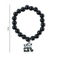Stylish pastel bead stretch bracelet laid flat highlighting glossy finish and charm