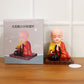 Decorative solar Buddha statue gently moving in peaceful posture