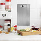 Close-up of hygienic stainless steel chopping board surface