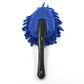 Microfiber car wash brush effectively removing dirt from a car's exterior body panel, leaving it spotless.
