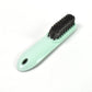 The versatile household scrubber shown with water, ready for deep cleaning.