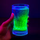 Elegant table setting featuring the LED Light Glass glowing vibrantly.