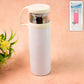 Glossy stainless steel water vacuum bottle placed on wooden surface