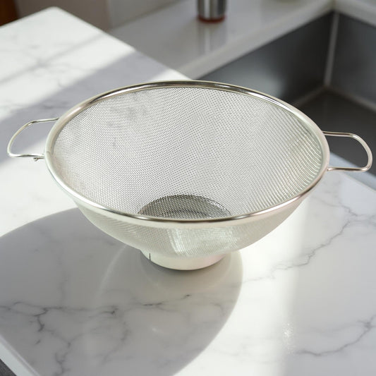 Dual ergonomic welded handles on stainless steel colander for easy grip