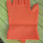 The Right-Handed Thumb Cutter Glove in action, picking fresh vegetables safely.