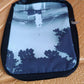 Close-up of the Glimmerly Period Kit Bag's soft velvet and Oxford fabric texture.