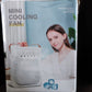 In-use lifestyle shot of portable air cooler fan with LED light