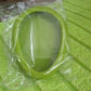 Vertical view of green vegetable container for storage