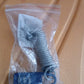 Close detail of anti-theft padlock's steel wire cable coated in PVC