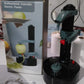 Electric peeler securely holding and peeling a potato automatically