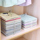 Lightweight wardrobe organizer for tidying up folded clothing at home.