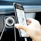 Mobile phone mounted securely on a car dashboard using a transparent nano gel pad.
