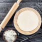 Chef pressing dough in the Round Roti Maker to create a perfect chapati.