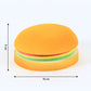 A set of burger notes shown from different angles, emphasizing their unique and playful design.