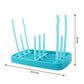 Removable tray collecting water below the baby feeding bottle drying rack