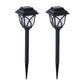 FitFuzion solar pathway lights casting bright, artistic patterns on a dark garden path, enhancing outdoor decor.