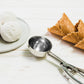 Detailed view of the premium stainless steel ice cream scoop head.