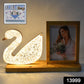 Close-up of duck crystal LED lamp showcasing photo frame element