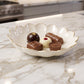Stylish lotus snack & dry fruit platter on display