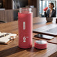 High-quality glass water bottle with silicone sleeve and leak-proof cap
