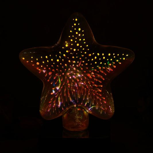 Star shape 3D illusion night lamp illuminating vibrant colors in a dark room