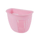Kitchen organizer basket mounted next to a sink, holding sponges and dishwashing liquid.