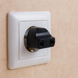  2 Pin Plug Adapter for universal to Indian sockets, shown in its color box packaging.