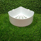 Empty triangle wall mount storage basket ready for use.