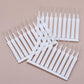 The shower head cleaning brush set displayed with a focus on its ergonomic handle.