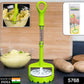 Person mashing boiled potatoes effortlessly with the spring press potato masher.